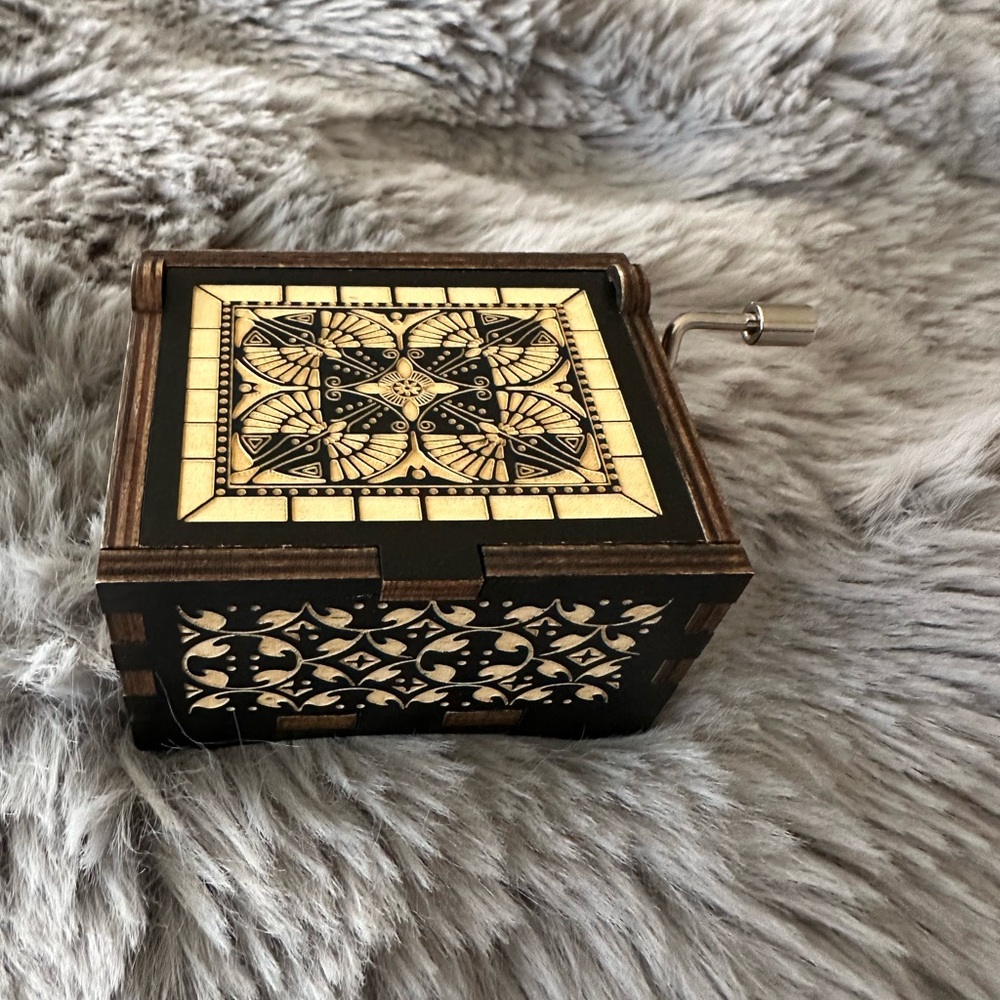 Intricate Wooden Music Box with Geometric Design